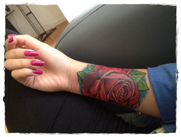 bigrose rose tattoo on wrist