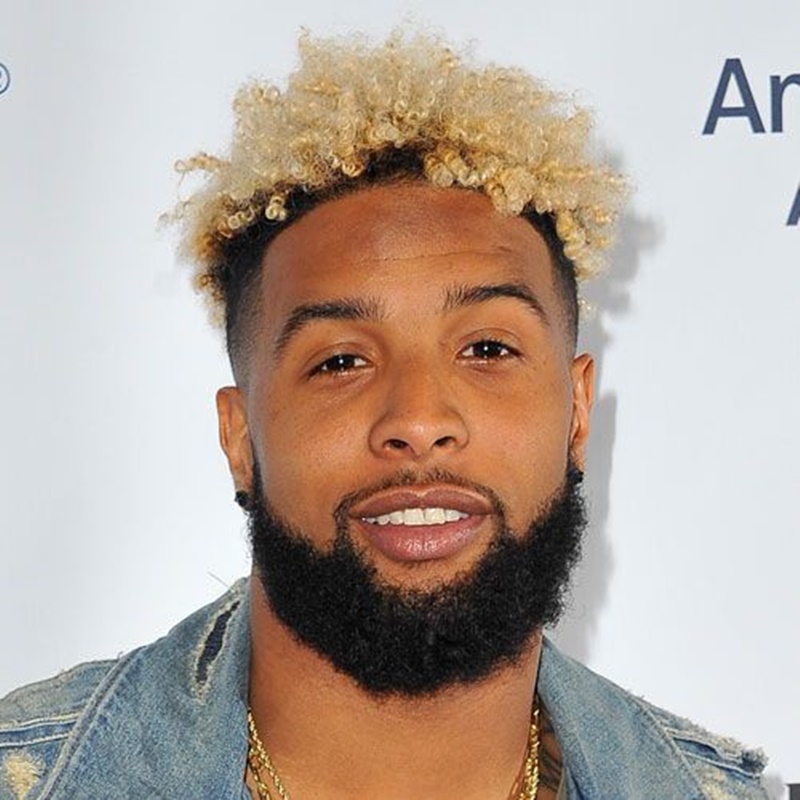 Blonde sponge afro with pattern Odell Beckham haircut.