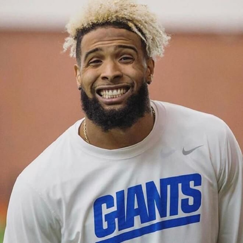 Messy top Odell Beckham Platinum color hairstyle.