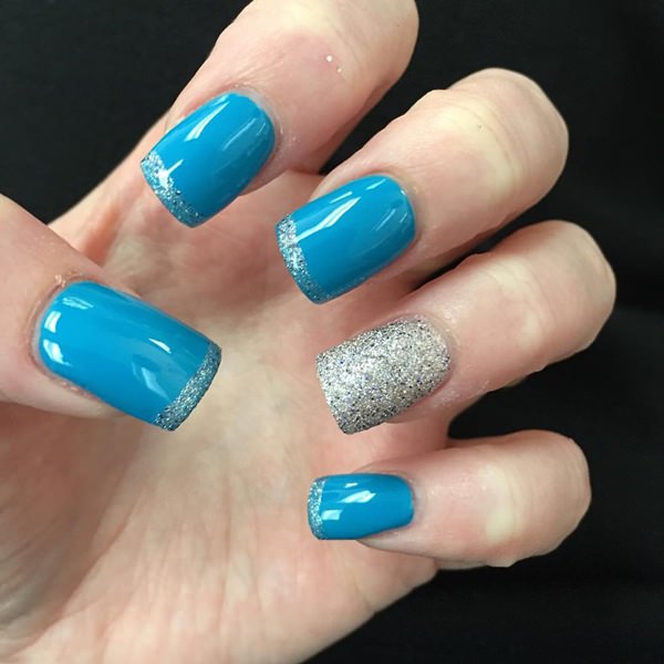 Sky blue and silver dust nail polish